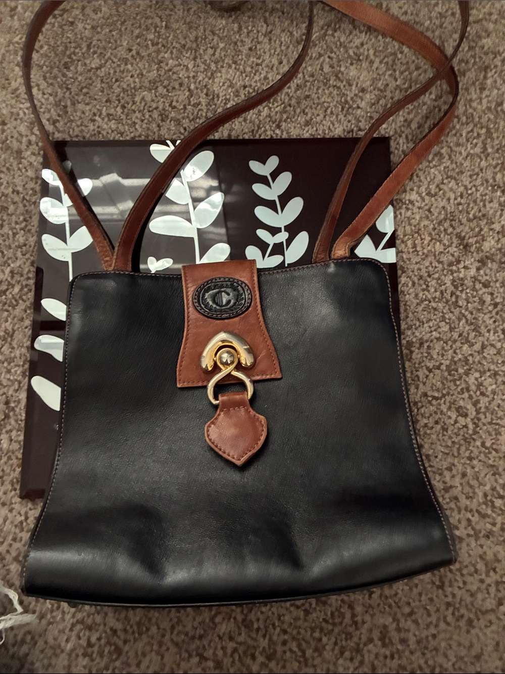 Vintage Black Leather Shoulder Bag with Brown Trim and Gold Hardware
